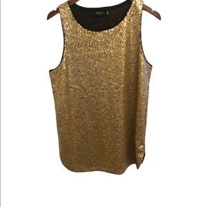 Gold sequins tank. Never worn. Lined with hemmed bottom edge.